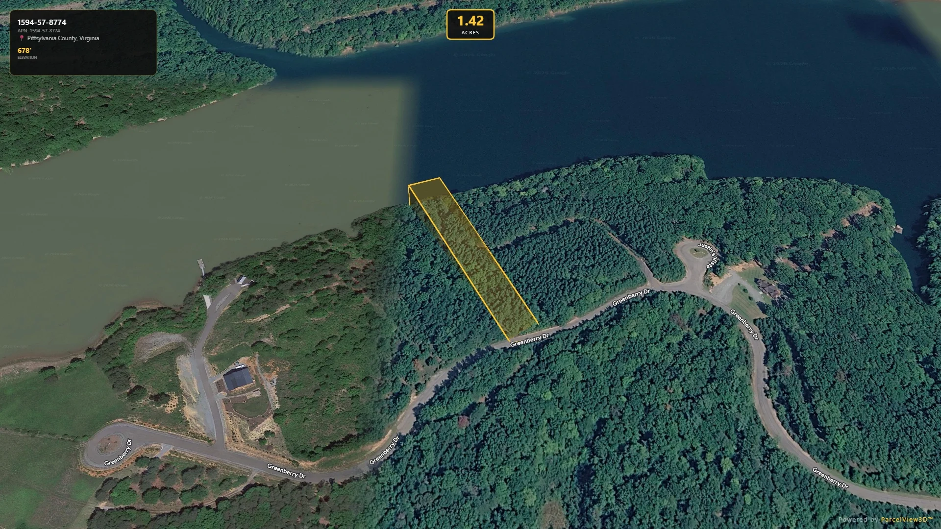 Vacant lot with paved road frontage, serene lake access and resort style amenities