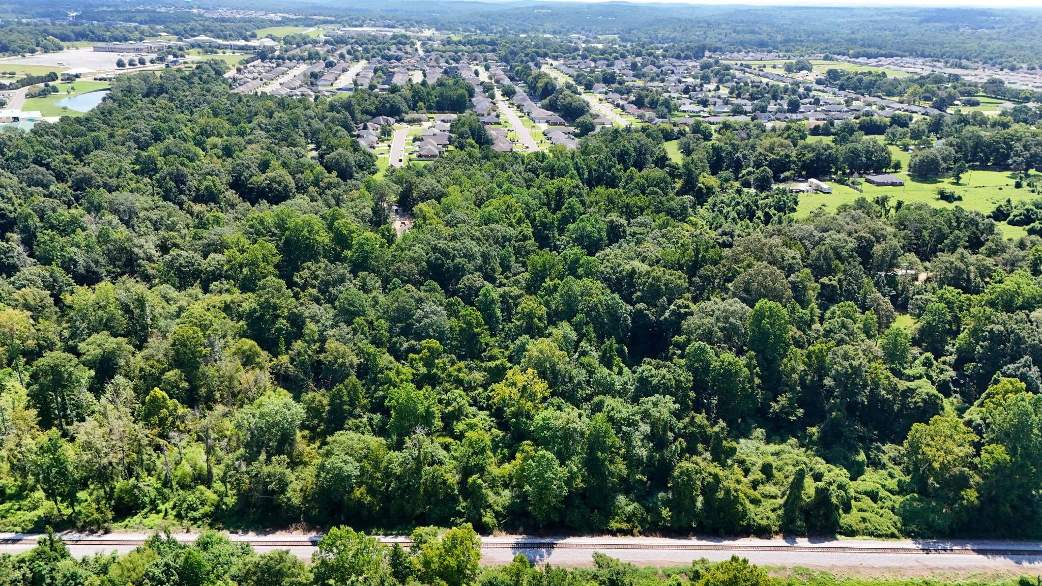 4.40 Wooded Acres Set in Tuscaloosa, Alabama with Creek, Utilities, & Safe Family Cul-de-Sac Living in Tuscaloosa County, AL