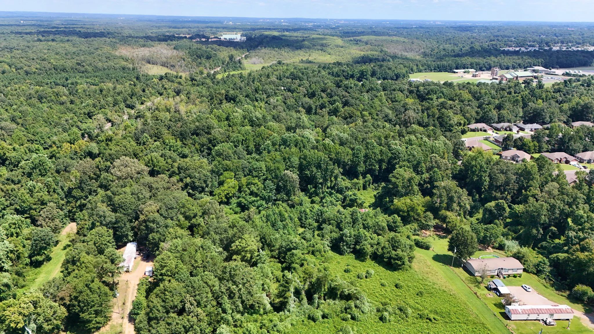 4.40 Wooded Acres Set in Tuscaloosa, Alabama with Creek, Utilities, & Safe Family Cul-de-Sac Living in Tuscaloosa County, AL
