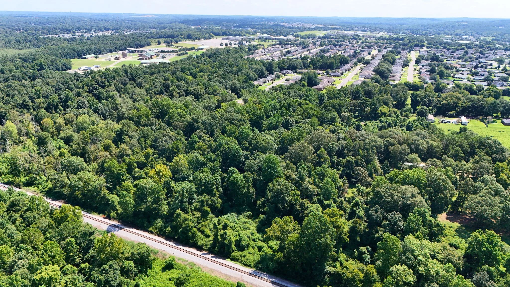 4.40 Wooded Acres Set in Tuscaloosa, Alabama with Creek, Utilities, & Safe Family Cul-de-Sac Living in Tuscaloosa County, AL