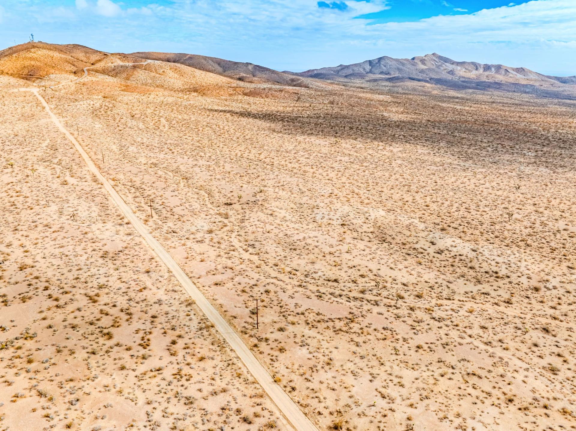 Decorative background for Panoramic Mountain Views + Power — 4.76 Acres in Adelanto, CA image 8