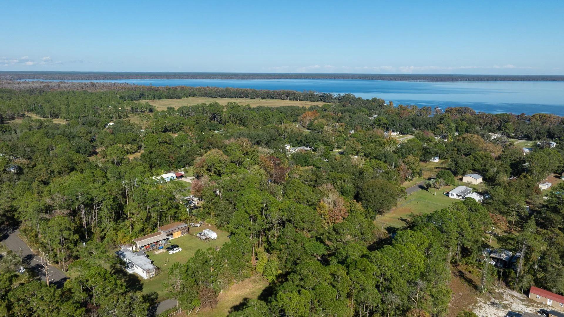 Decorative background for Florida Homesite Opportunity - 0.4 Acres in Crescent City, Water Nearby image 8