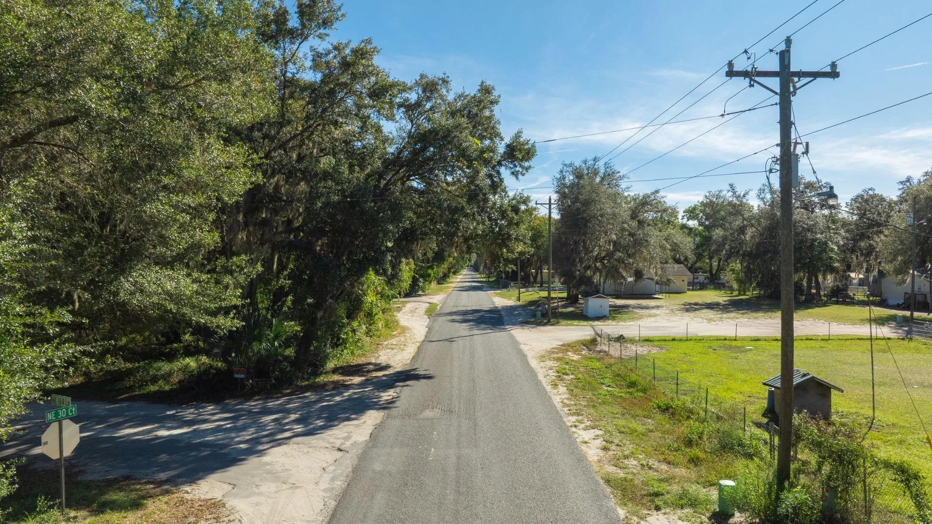 Decorative background for 0.38 Acre Citra FL Property – Proximity to Gainesville and US-301 for Easy Access image 10