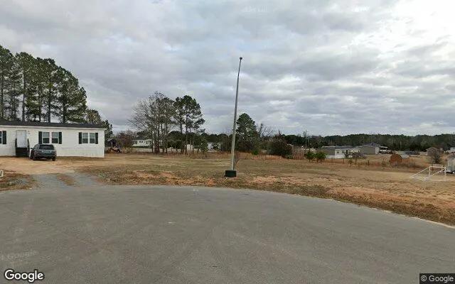 Decorative background for 0.55 Acres in Coats - Harnett County, NC image 6